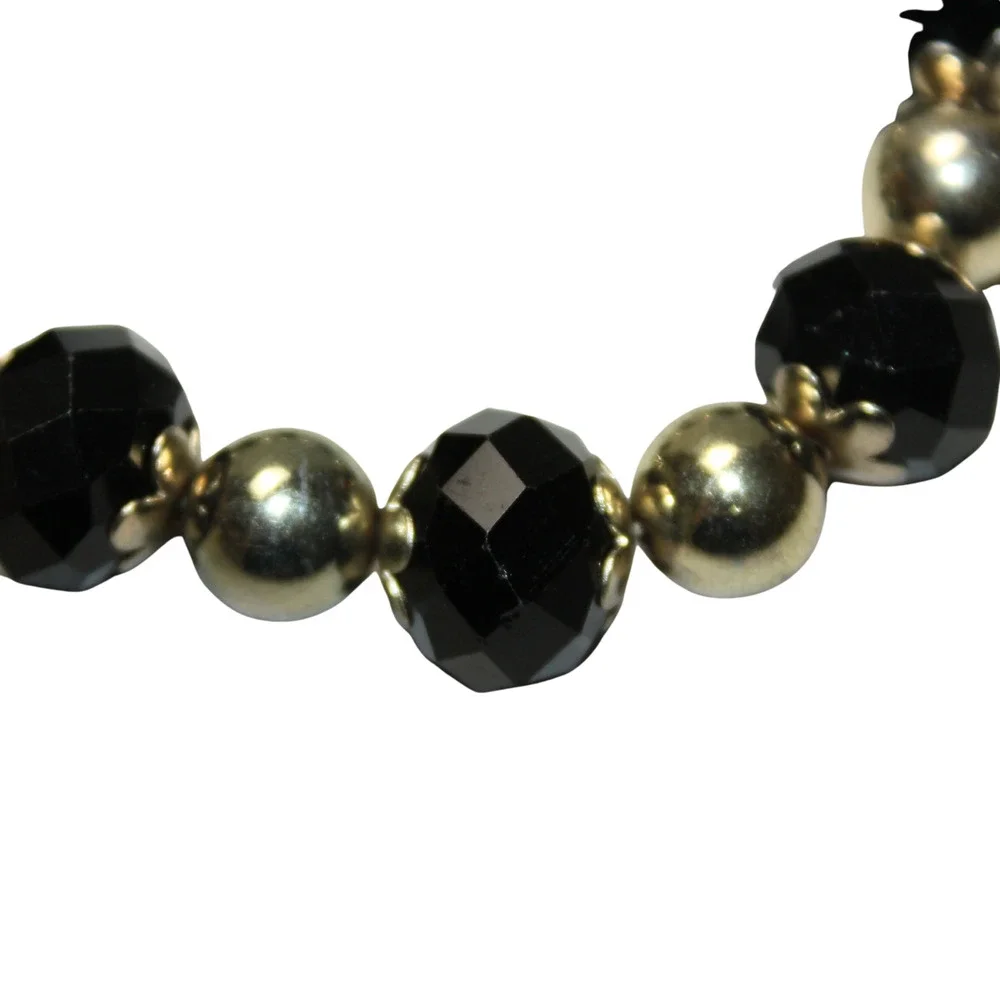 Gold Tone and Black Faceted Rondelle Glass Bead Stretch Bracelet